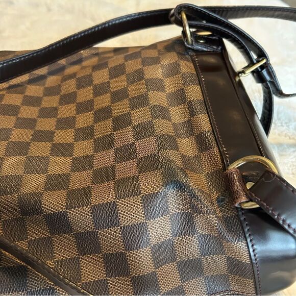 AUTHENTIC Louis Vuitton Damier Ebene
Soho backpack